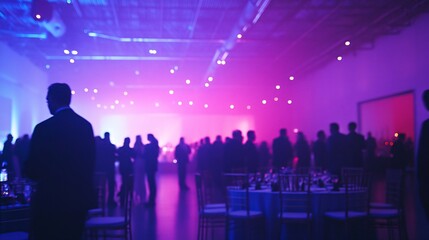 Elegant evening gala with guests mingling in a vibrant, dimly lit venue.
