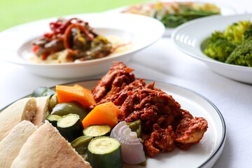 Photography of homemade plated meals. Ranging from rice dishes to wraps to chicken to pasta.