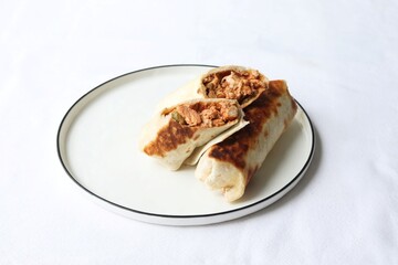 Photography of homemade plated meals. Ranging from rice dishes to wraps to chicken to pasta.