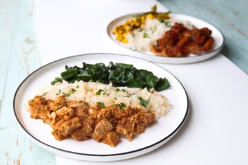 Photography of homemade plated meals. Ranging from rice dishes to wraps to chicken to pasta.