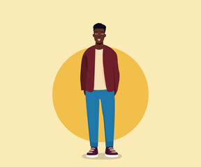 African American guy standing with a smile. Dressed in comfortable casual clothes.
