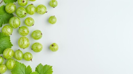 Fresh green gooseberries with green leaves scattered on a white background, minimalistic and clean fruit composition, isolated with copy space for text, vibrant and organic seasonal produce photograph