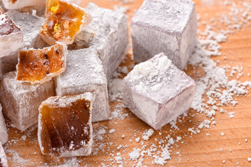 Sweet food Turkish delight, assorted rahat locum in form of cubes with nuts and powdered sugar, traditional food