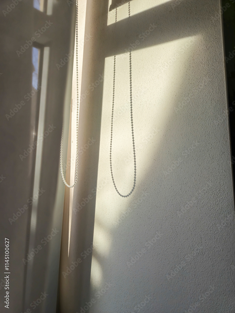 Poster a serene play of light and shadow creates a calming atmosphere in this photo of a window with delica