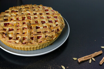 Homemade Plum Pie with Shortcrust Pastry and with Woven Lattice Top Pie Crust