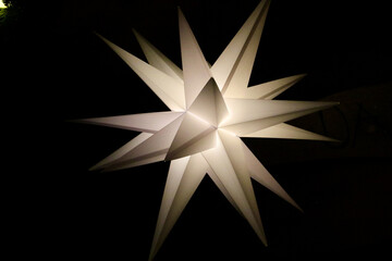white star on black background