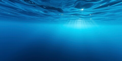 Rippling deep blue waves with sunlight reflecting off the surface, waves, underwater