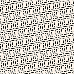 Vector abstract geometric seamless pattern. Ethnic folk motif ornament with diagonal lines, rhombuses, chevron, zig zag. Black and white texture. Minimal monochrome background. Repeated modern design