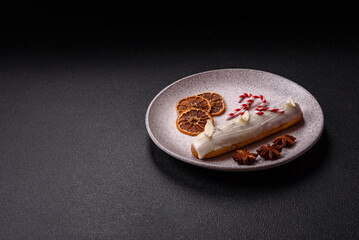 Sweet eclair with chocolate filling covered with white glaze