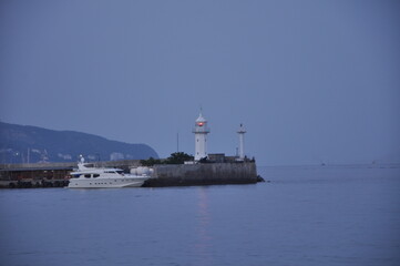 yacht sea and lighthouse 