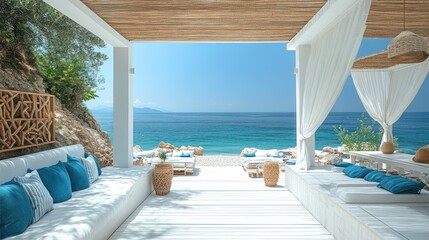 Fototapeta premium Coastal lounge area with ocean view, white furniture, and blue accents.