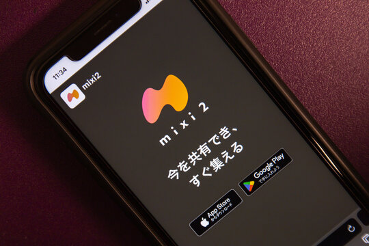 Mexico City, MEXICO - Dec 18 2024 : Website of mixi2, Japanese SNS succeeding the popular 2000&rsquo;s platform &lsquo;mixi&rsquo;, is displayed. Translation : Share the present and gather together right away.