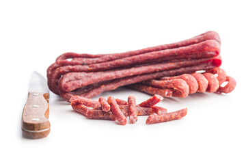 Smoked kabanos. Mini dried thin sausages isolated on white background