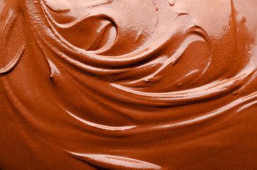 Close up of the texture of melted chocolate. 