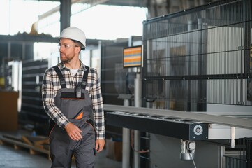 Factory worker. Man working on the production line