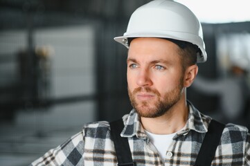 portrait of a confident worker in a factory