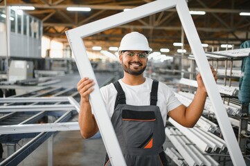 PVC industry worker or operator making frames for windows and doors