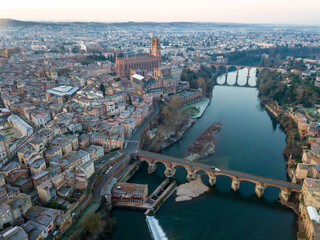 Obraz premium View from drone of town of Albi with Sainte-Cecile cathedral and Tarn river, France..