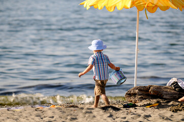 Small child at the beach.