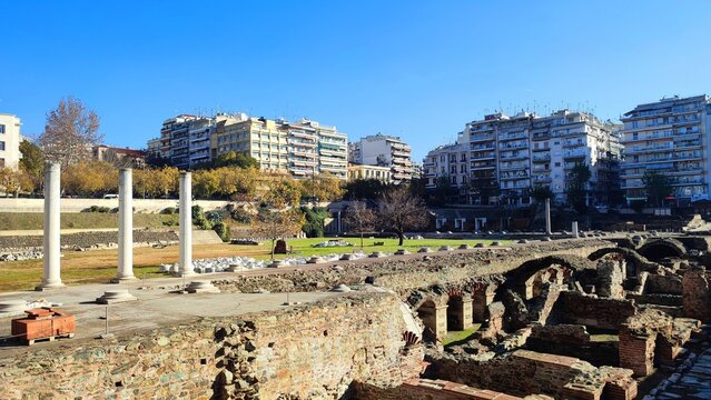 Photo of the Roman Forum of Thessaloniki, ruins of a 2nd-century Roman forum featuring a restored amphitheater, along with excavated corridors and arches.