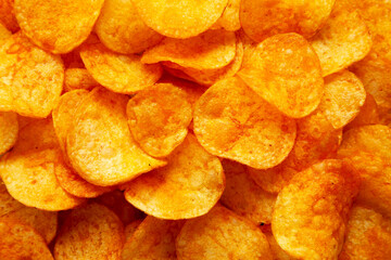 Homemade Flavored Paprika Potato Chips in a Bowl, top view. Flat lay, overhead, from above.