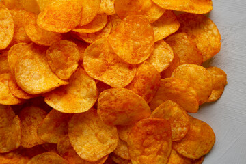 Homemade Flavored Paprika Potato Chips in a Bowl, top view. Flat lay, overhead, from above.