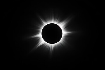Astounding Eclipse. A Total Solar Eclipse with the Moon Obscuring the Sun Against a Dark Sky