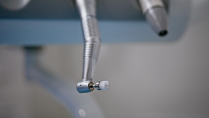 Closeup modern dental drill in dentist office. Professional equipment for oral