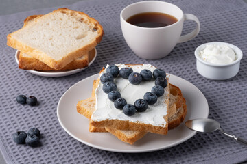 Sandwich with cream cheese and blueberries