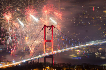 ISTANBUL, TURKEY. New Year 2024 Celebrations Around the Istanbul. Fireworks with Istanbul Bosphorus Bridge (15th July Martyrs Bridge). Camlica Hill very nice view Uskudar, Istanbul when time 00:00
