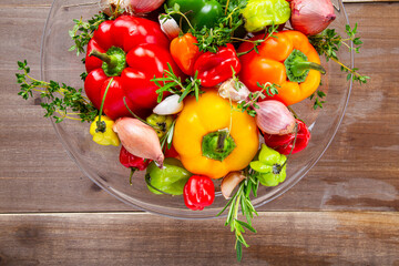 Overhead Colorful Assorted Fresh Healthy Organic Vegetables and Fruits in a Glass Bowl