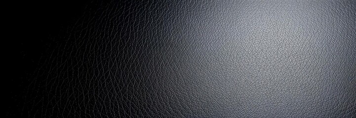 Close-up shot of a luxurious black leather texture with shining surface, surface, fashion, elegant