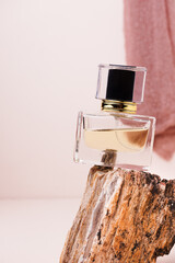 Perfume bottle mockup with cream background, mockup for your perfume product brand