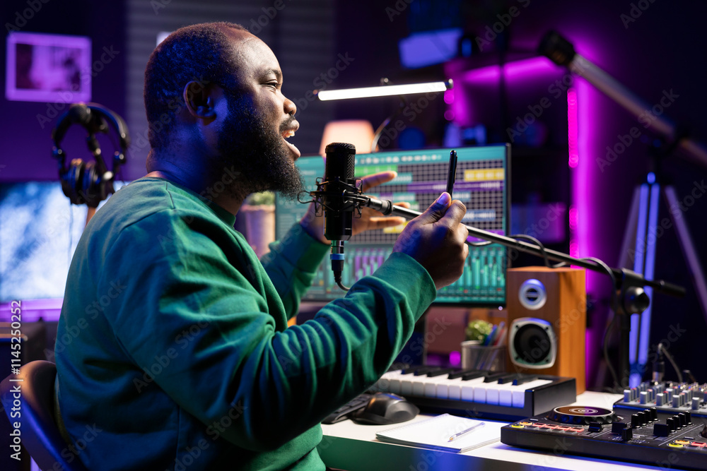 Poster african american composer recording audio files on his song, adding special effects and editing with