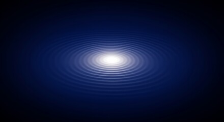 Dark blue water ripples with concentric light waves.  Radial pattern.