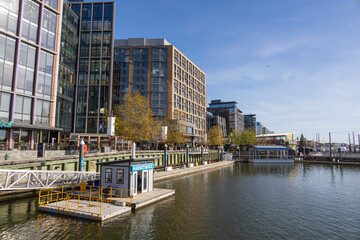 Discover the lively atmosphere of Washington DC's Wharf, featuring modern architecture, waterfront...