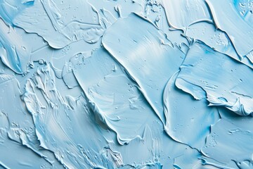  Many rough light blue smears of acrylic oil paint on flat surface. Detailed photo textured...