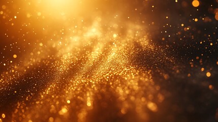Obraz premium Golden glitter particles glowing in dark background.