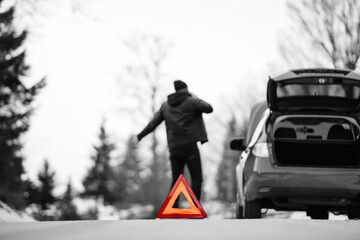 Displeased man breaks down car in the middle of trip on the road calls tow truck to come repair...
