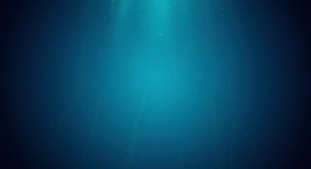 Obraz premium Deep Sea Mystery: An ethereal underwater scene, bathed in the soft, ethereal glow of a sunbeam that pierces through the deep blue water, creating a sense of wonder and mystery. 