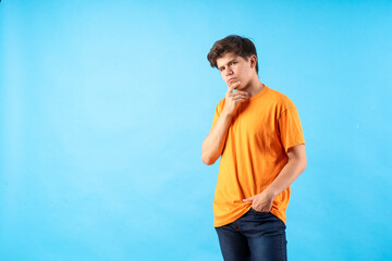 Young person expressing various emotions and body pains, pointing, using a cellphone, with colored...