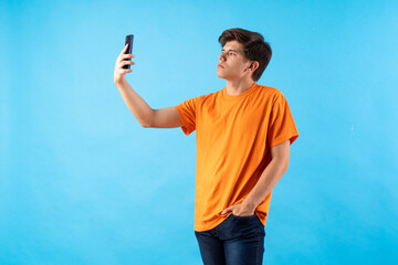 Young person expressing various emotions and body pains, pointing, using a cellphone, with colored...