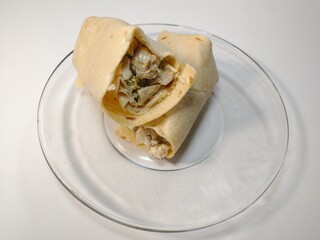 Chicken Chunk Burrito Sandwich Wrap Half Sliced Corn Yellow Clear Glass Plate
