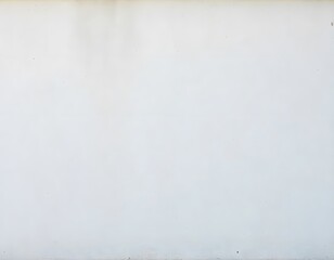 Fototapeta premium White Concrete Wall: Minimalist, textured white concrete wall background.