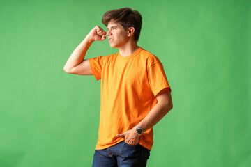 Young person expressing various emotions and body pains, pointing, using a cellphone, with colored...