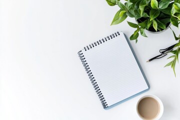 Fototapeta premium Minimalist Workspace with Notebook, Coffee, and Plant