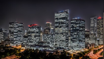 Naklejka premium corporate office skyline at night