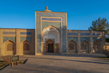 View of the Bab-i-Islam Gate (Bobi Islom Gate) to the Bahauddin Naqshbandi Memorial Complex on a...