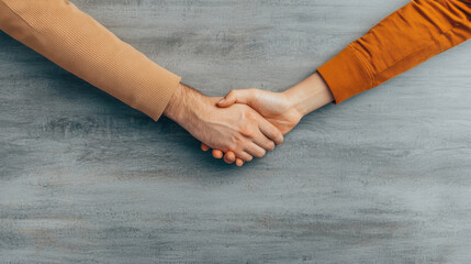 handshake symbolizes partnership and collaboration between two individuals. This captures essence of teamwork and mutual agreement in professional setting