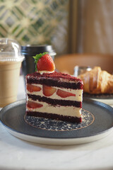 Enjoy a delightful slice of Delicious Red Velvet Strawberry Layer Cake, perfect for any occasion